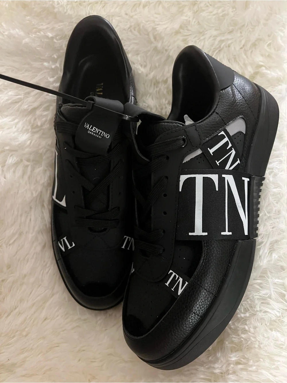 Valentino Garavani Black Sneakers with White Logo Accents